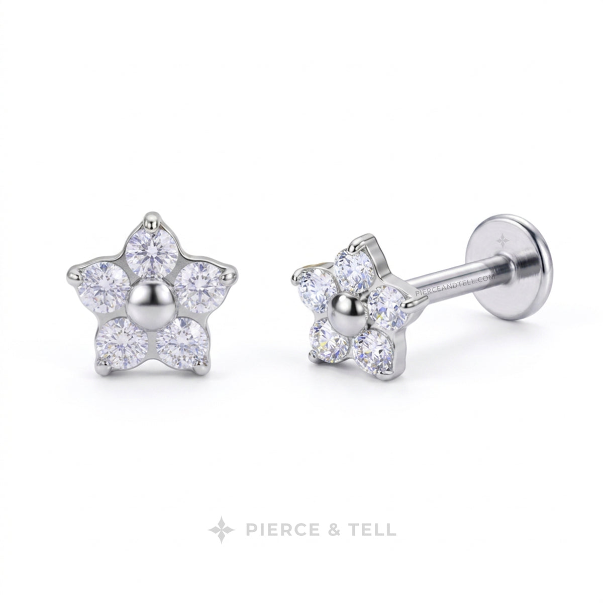 A pair of silver flower-shaped stud earrings with clear round-cut gemstones, shown on a clean white background. One earring is facing forward, and the other is angled to show the post and flat back.