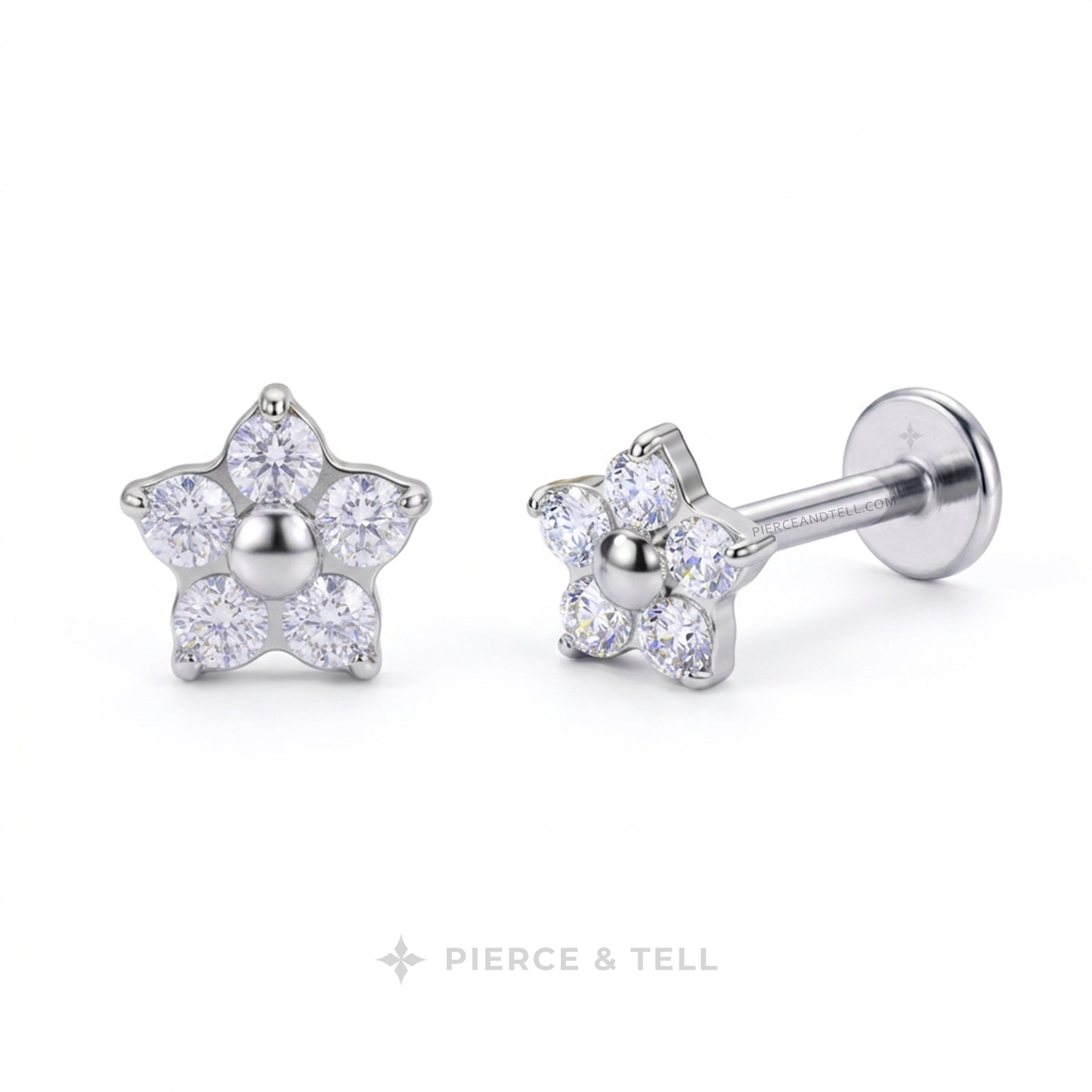 A pair of silver flower-shaped stud earrings with clear round-cut gemstones, shown on a clean white background. One earring is facing forward, and the other is angled to show the post and flat back.