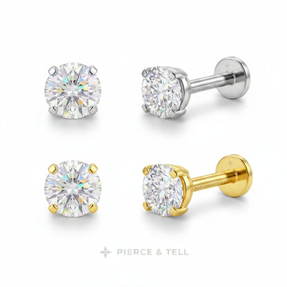 Four stud earrings shown on a white background: two front views and two side views. The studs feature round brilliant-cut clear gemstones in silver and yellow gold settings.