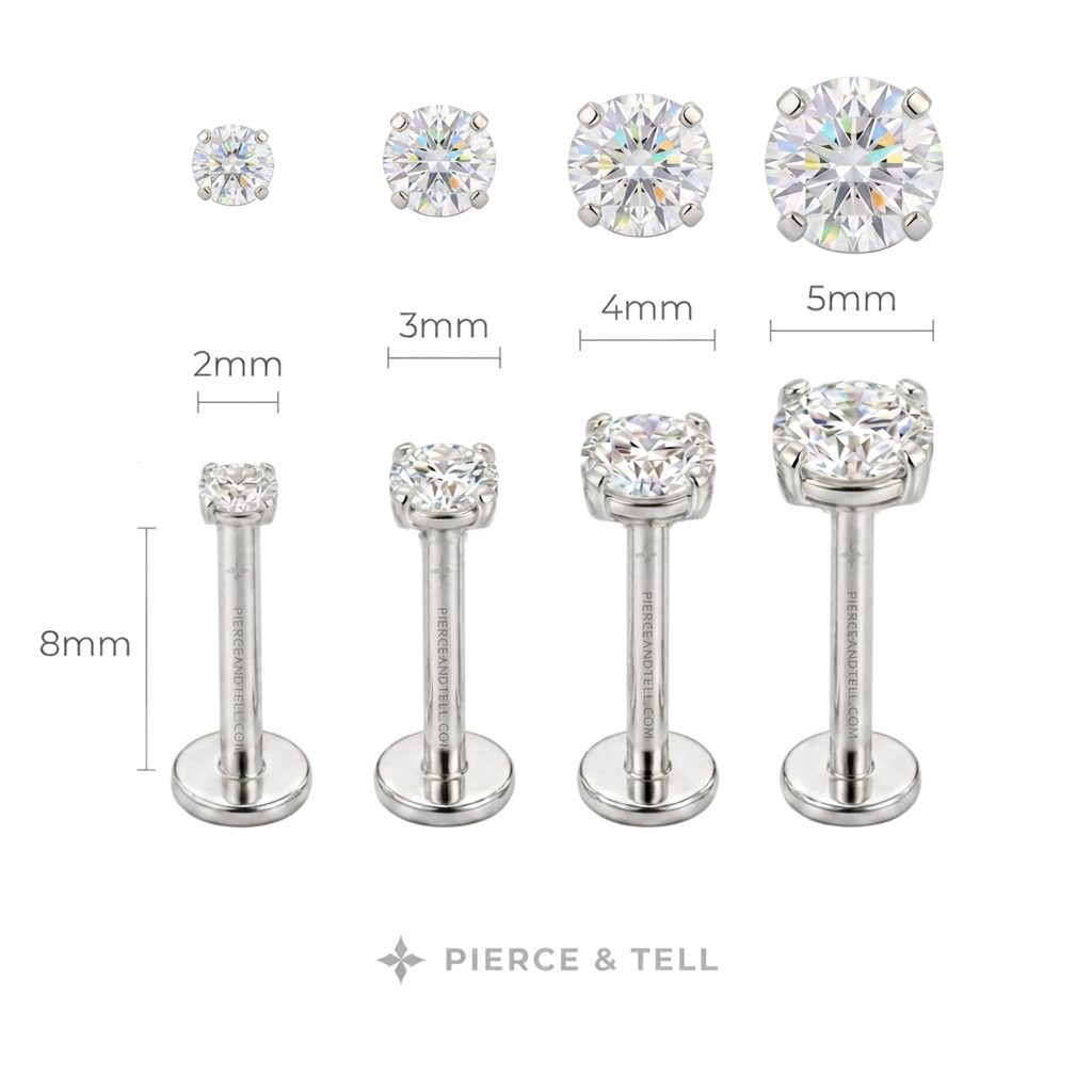 four round-cut stud and labret ear piercings in silver-tone metal with clear gemstones, shown in graduated sizes from 2mm to 5mm width and 8mm depth, with measurement labels and the brand name PIERCE & TELL at the bottom.