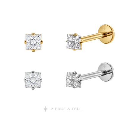 Four stud earrings shown on a white background: two with gold-toned settings and two with silver-toned settings, each featuring a clear princess-cut gemstone. The back views show round gold and silver posts and backing.