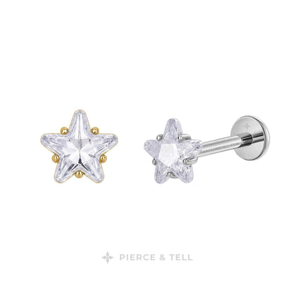 Star-shaped stud earrings with clear faceted crystals and small gold accent beads, shown on a white background with the brand name PIERCE & TELL below.