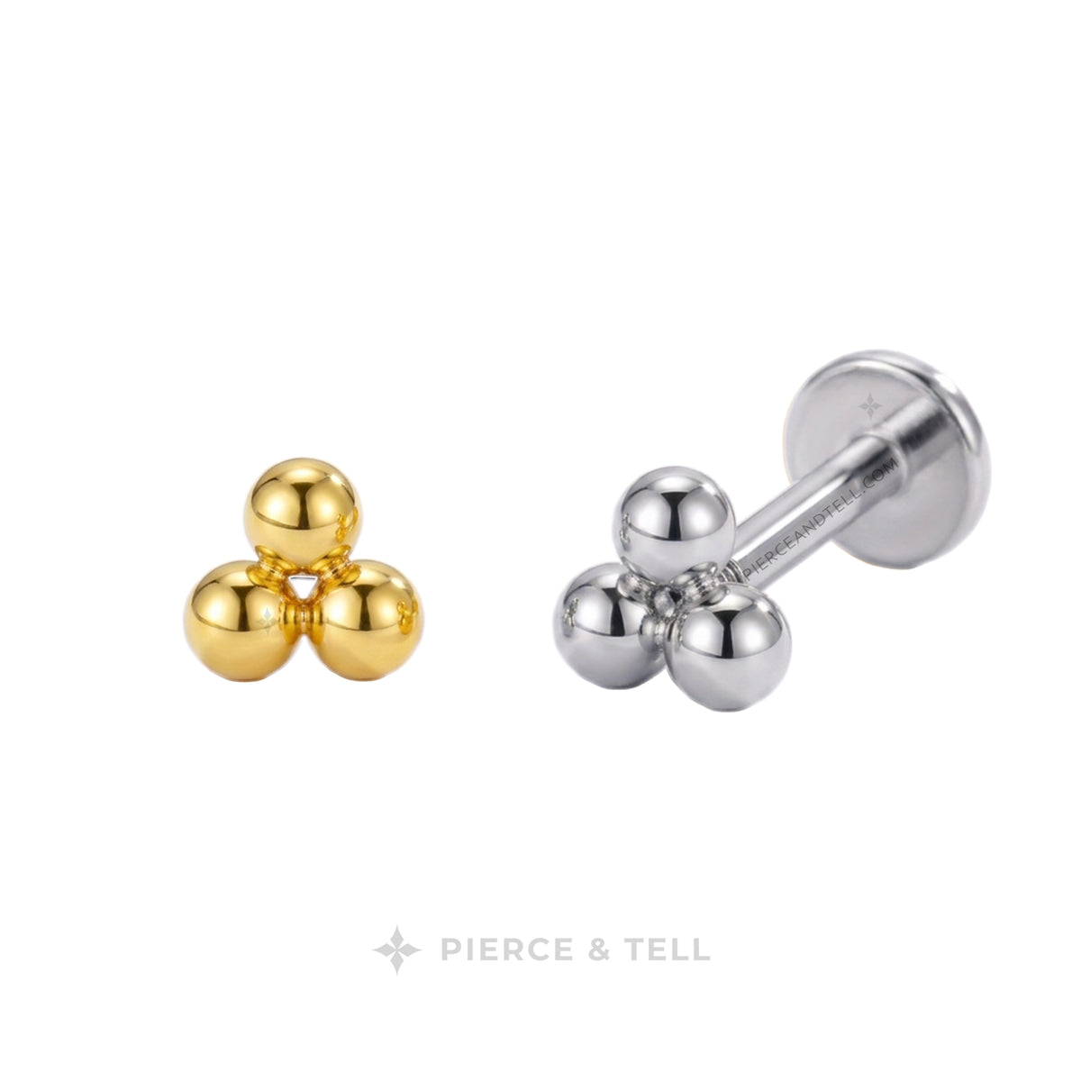 Two small metallic stud earrings on a white background: one gold-tone cluster of three rounded beads and one silver-tone cluster of three rounded beads with a barbell backing. The brand name PIERCE & TELL appears below.