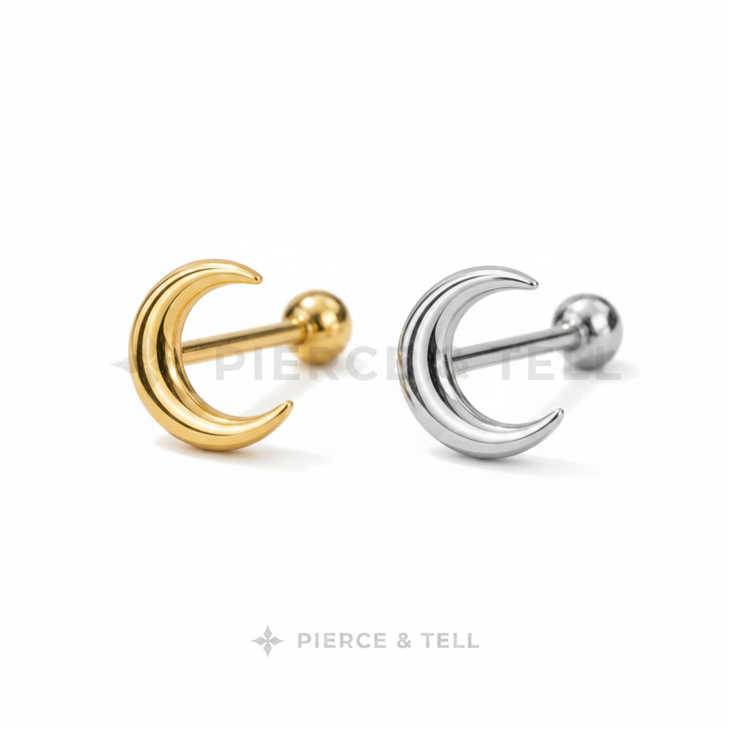 Gold and silver moon-shaped earrings on a light gray background with 'Pierce & Tell' branding.