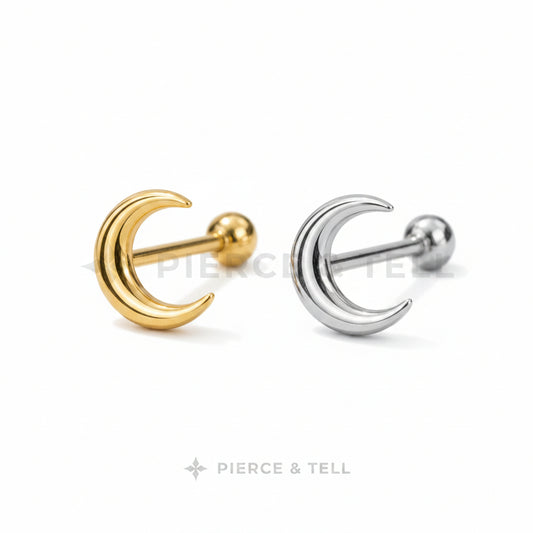 Gold and silver moon-shaped earrings on a light gray background with 'Pierce & Tell' branding.